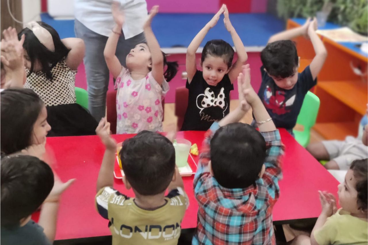 Children expressing themselves through painting