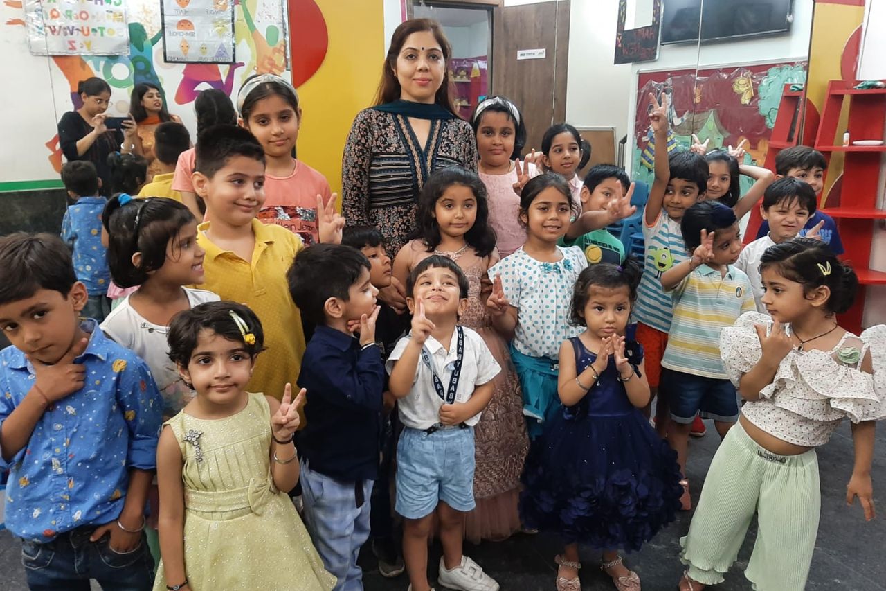 Children sharing a joyful creative classroom moment