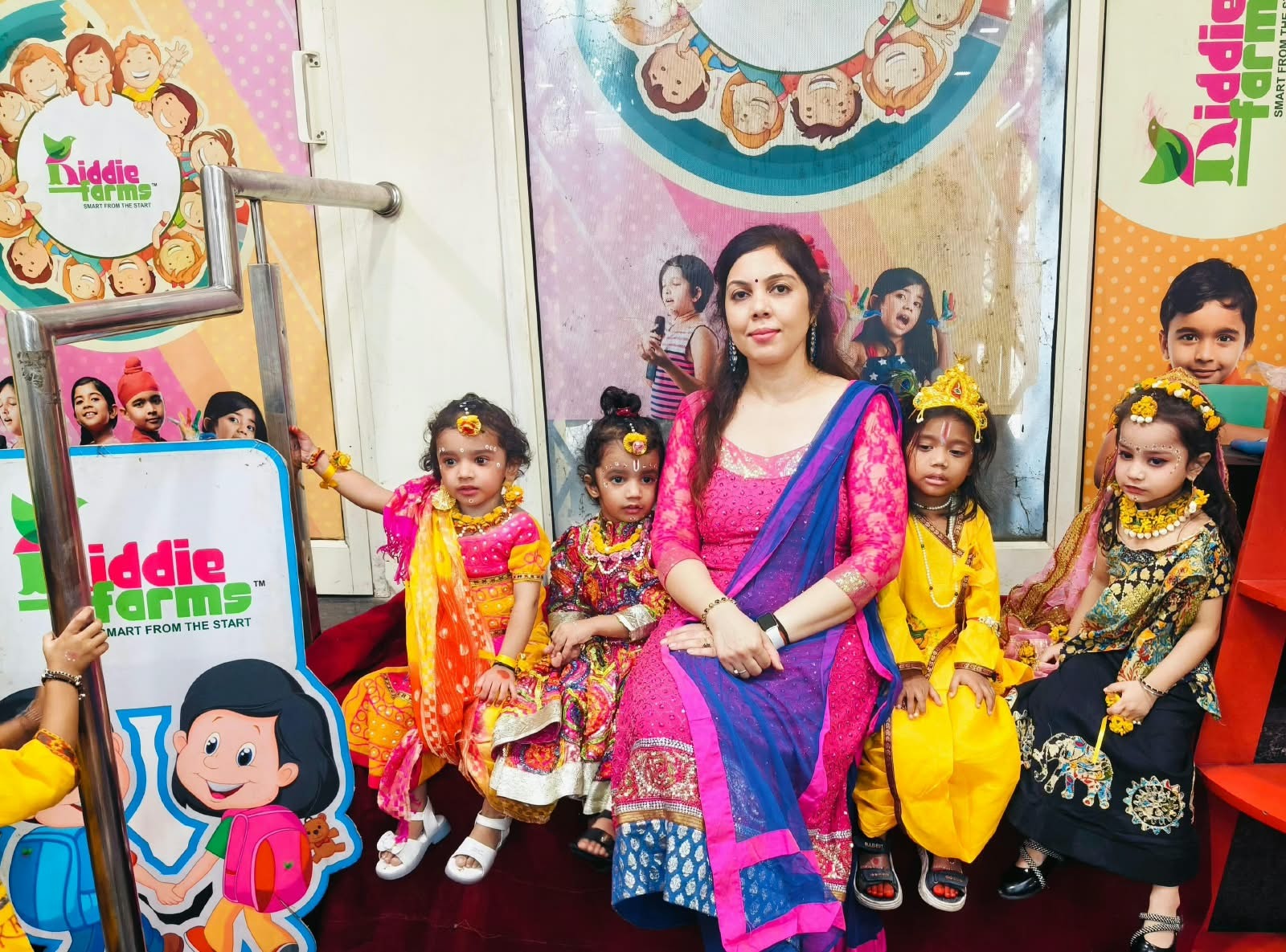 Children painting and exploring creative curriculum activities at Kiddie Farms School